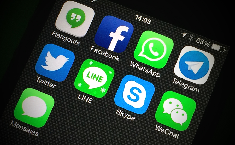 a cellphone screen with a collection of social networking app icons