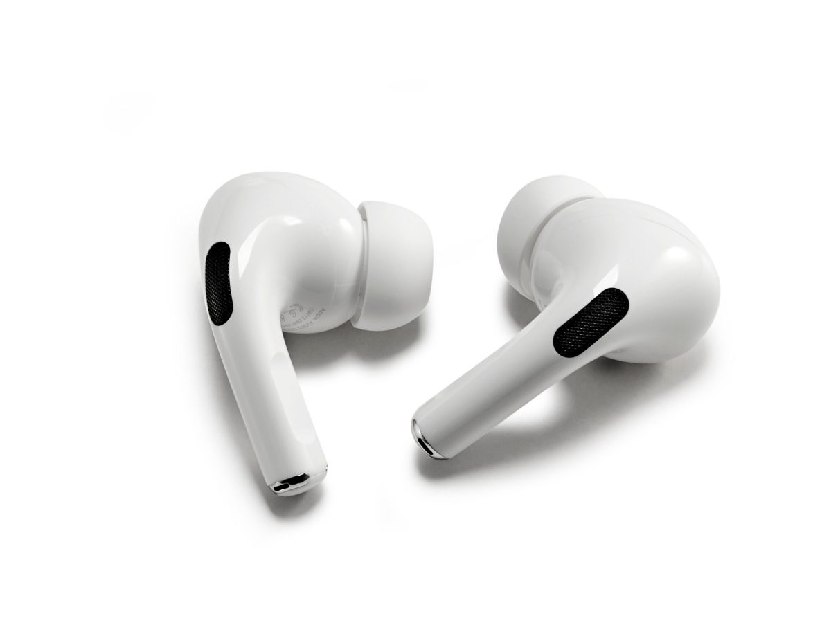 A pair of Apple AirPod Pro ear buds against a white background.