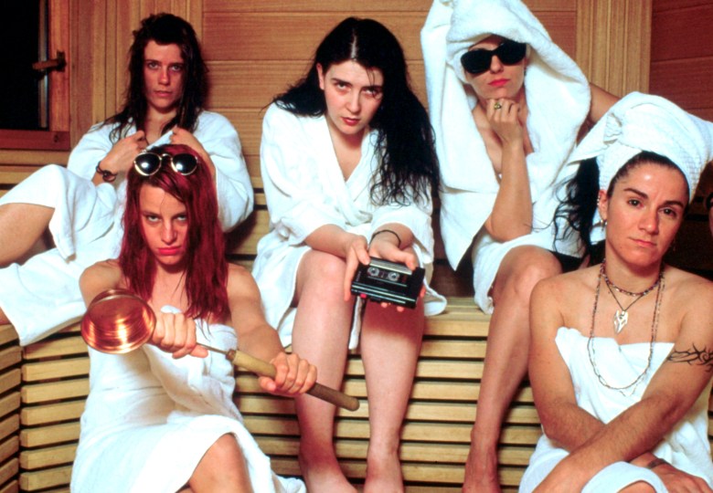 Portrait of grunge band L7 sitting in a sauna, photographed in the early 1990's.