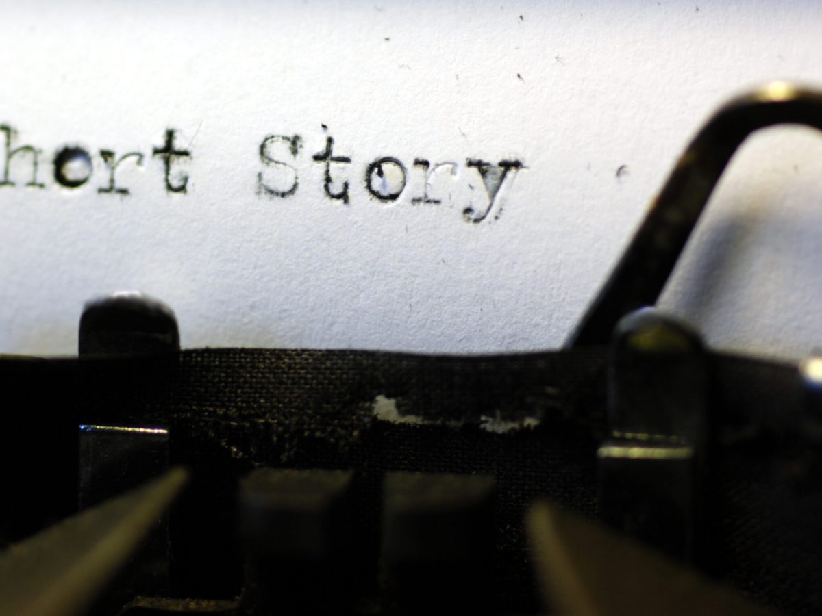 "The words 'short story' picked out on a grungy old typewriter."
