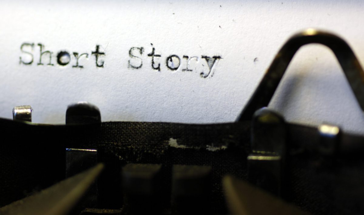 "The words 'short story' picked out on a grungy old typewriter."