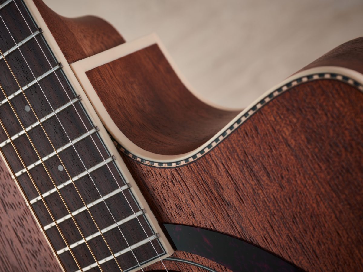 Detail of the cutaway on a Fender PM-3 Standard Triple-0 All-Mahogany NE acoustic guitar.