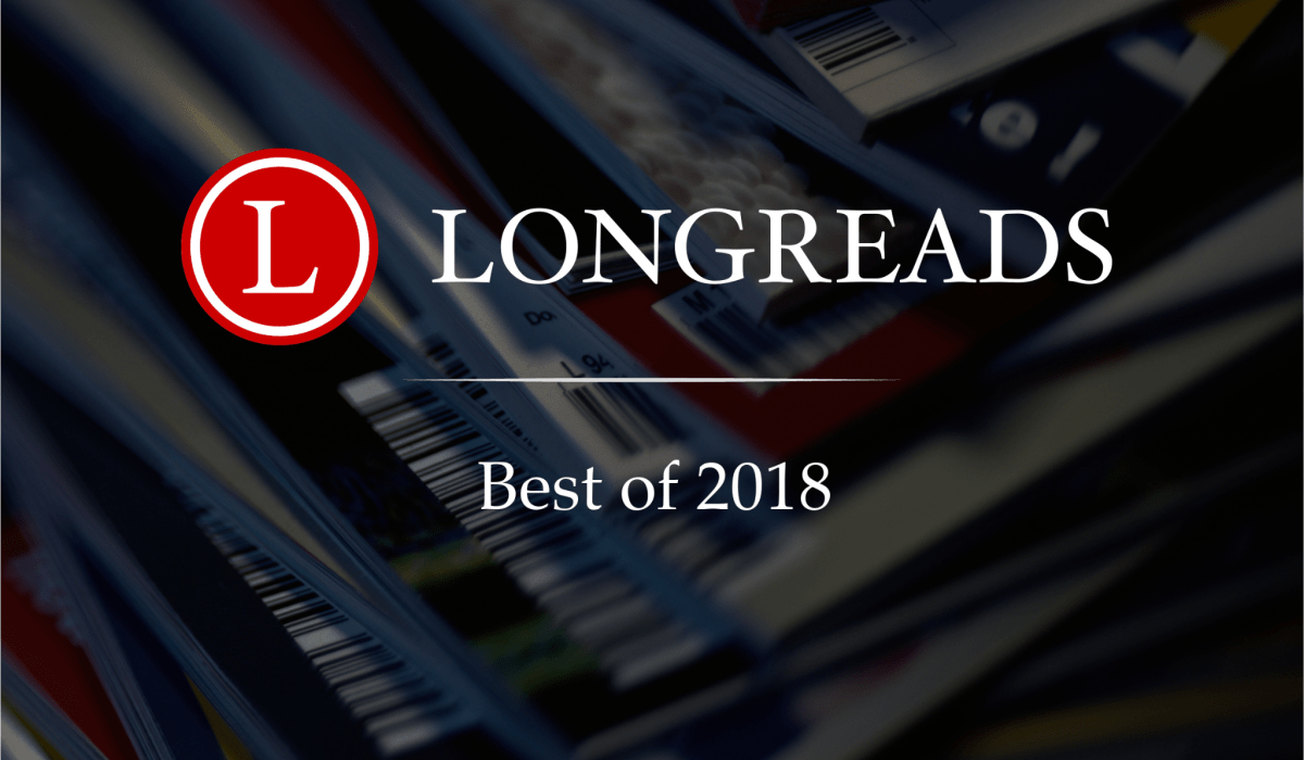 Graphic that reads Longreads Best of 2018 with background image of magazines stacked in a loose pile