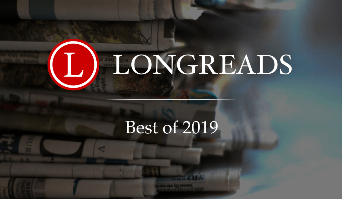 Graphic that reads Longreads Best of 2019 with background image of stacked, folded newspapers