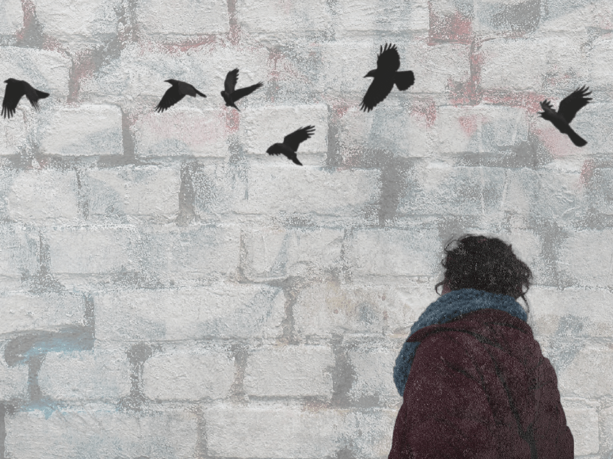 Image of woman looking up at crows in the sky. Abstract white brick background.